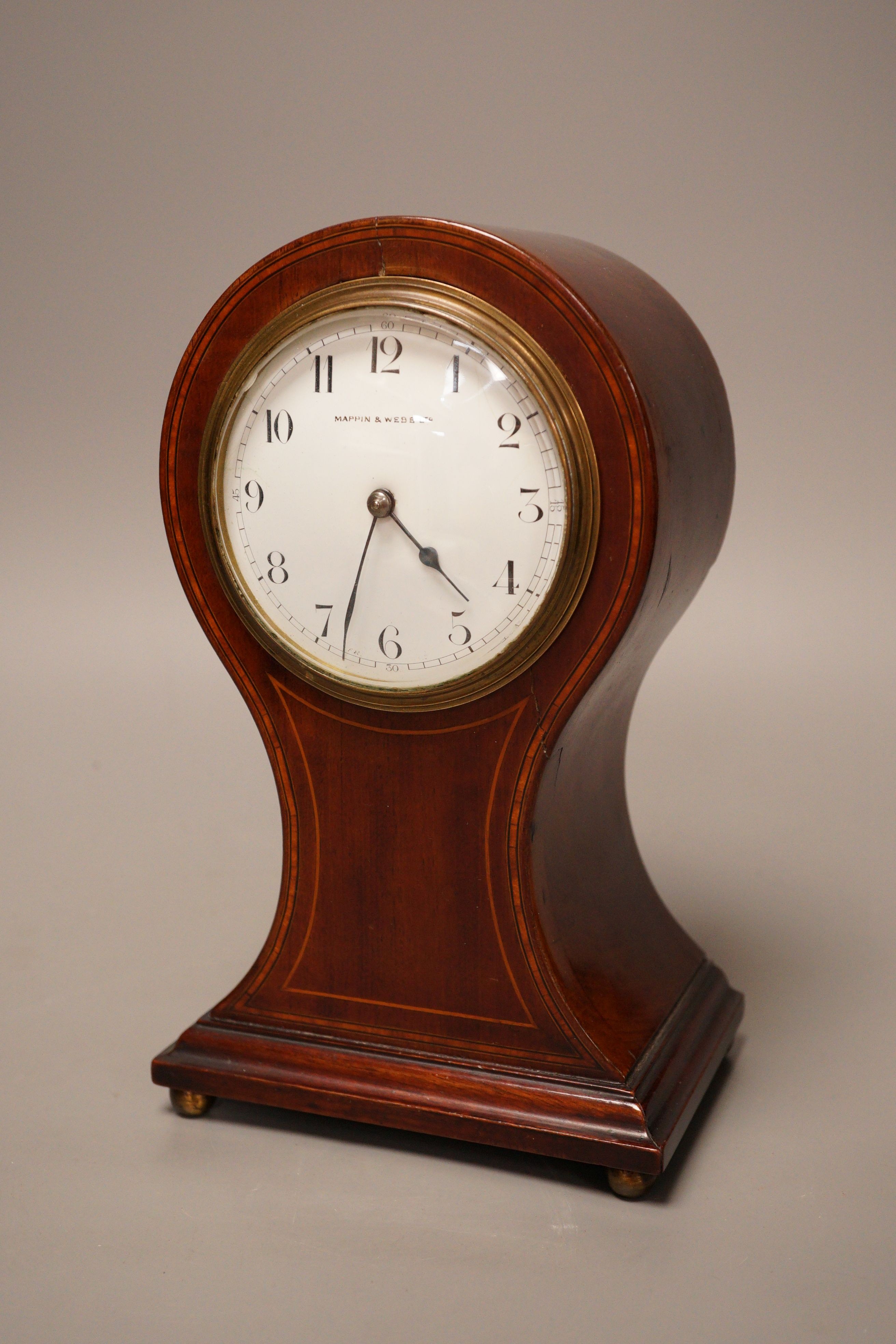 A Mappin & Webb mahogany mantel clock, 26cm tall